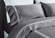 australian designed luxury organic cotton hotel collection sheet set in white with navy stitching